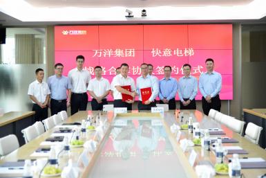 热烈祝贺304am永利集团电梯与万洋集团签署战术合作和谈
